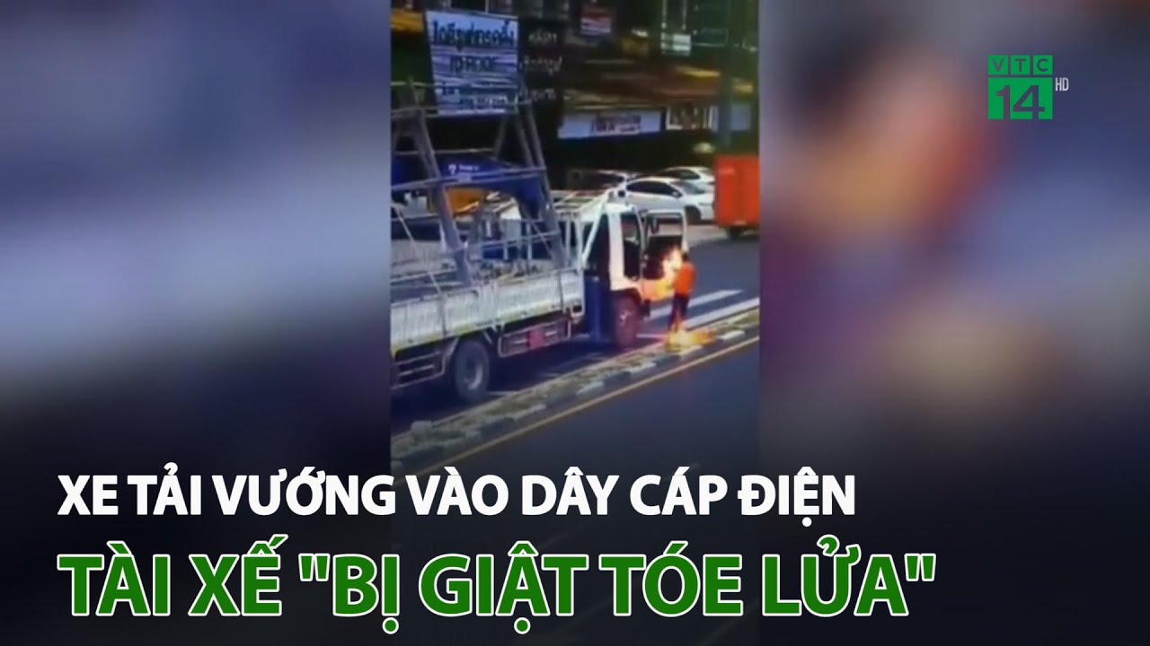 #1 Xe tải vướng vào dây cáp điện, tài xế “bị g.i.ậ.t tóe lửa” | VTC14 Mới Nhất